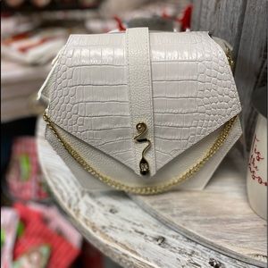 Available beautiful winter white leather tote